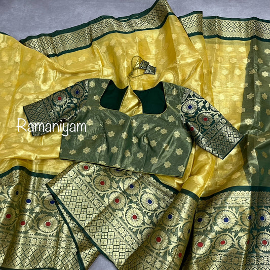 Gold tissue saree / Bottle green stitched blouse