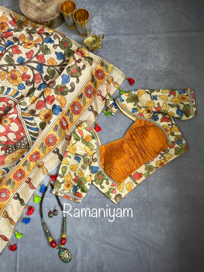 Mustard yellow Organza Bandhani saree with a Kalamkari pallu