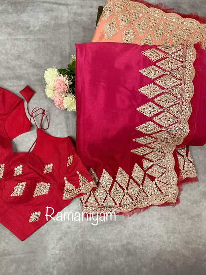 Party wear pink and red shaded crape silk saree embellished with intricate mirror work