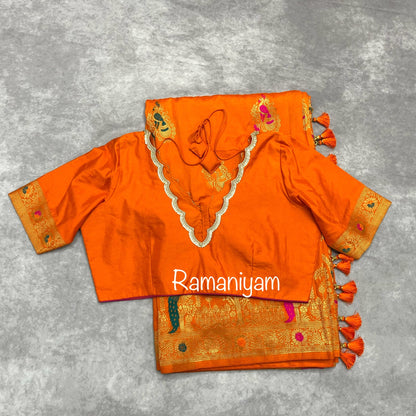 Orange Dola silk saree scalloped v neck blouse