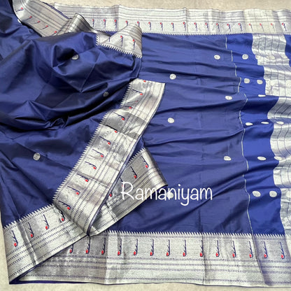 Navy blue Paithani saree with silver Muniya borders