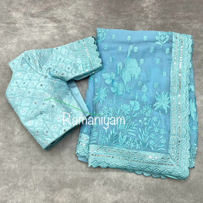 Powder blue georgette embroidery saree with mirror work blouse