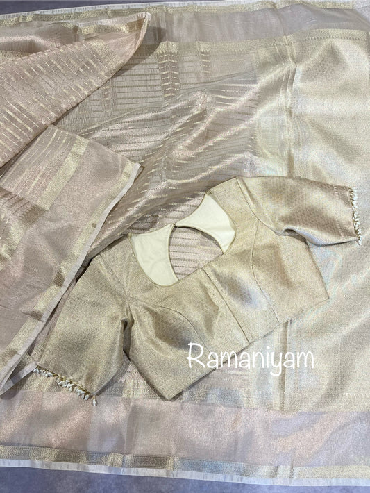 Banarasi tissue lines saree with designer blouse with pearls hangings for sleeves