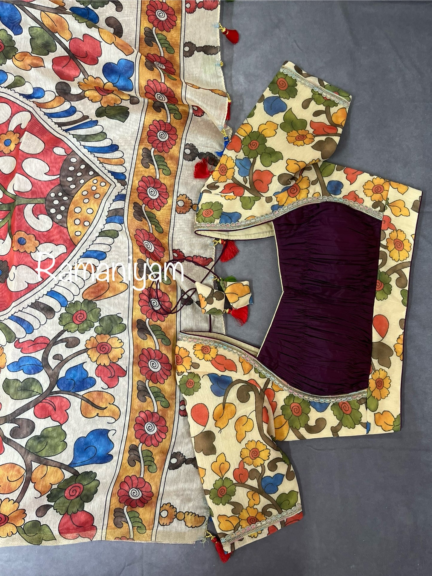 Wine color Organza Bandhani saree with a Kalamkari pallu