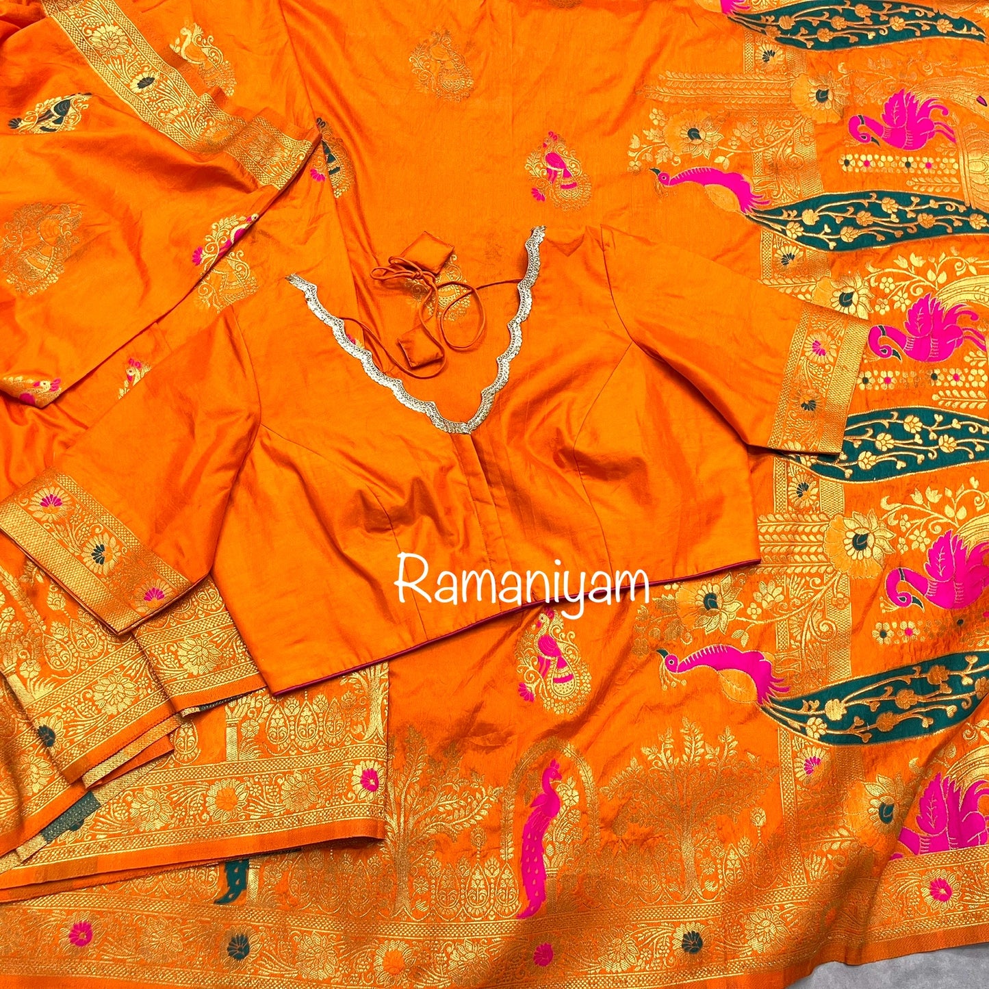 Orange Dola silk saree scalloped v neck blouse