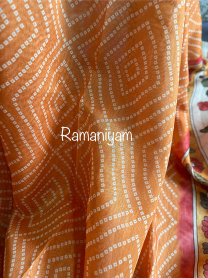 Mustard yellow Organza Bandhani saree with a Kalamkari pallu