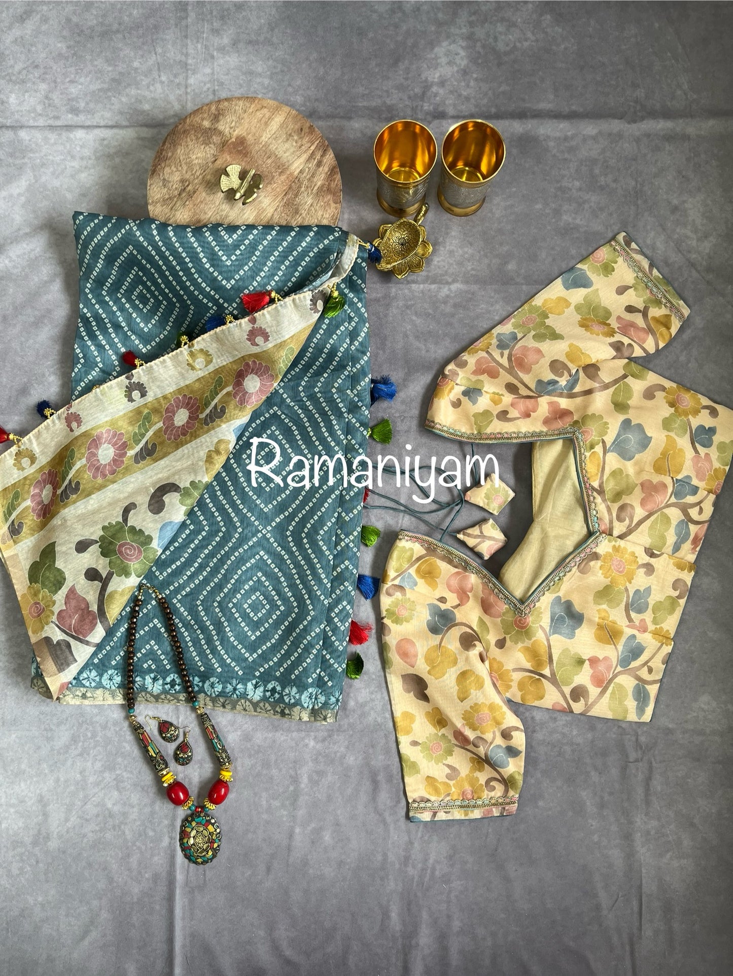 Grey Organza Bandhani saree with a Kalamkari pallu