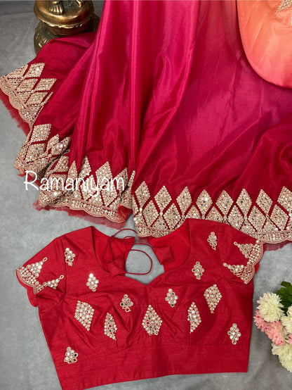 Party wear pink and red shaded crape silk saree embellished with intricate mirror work