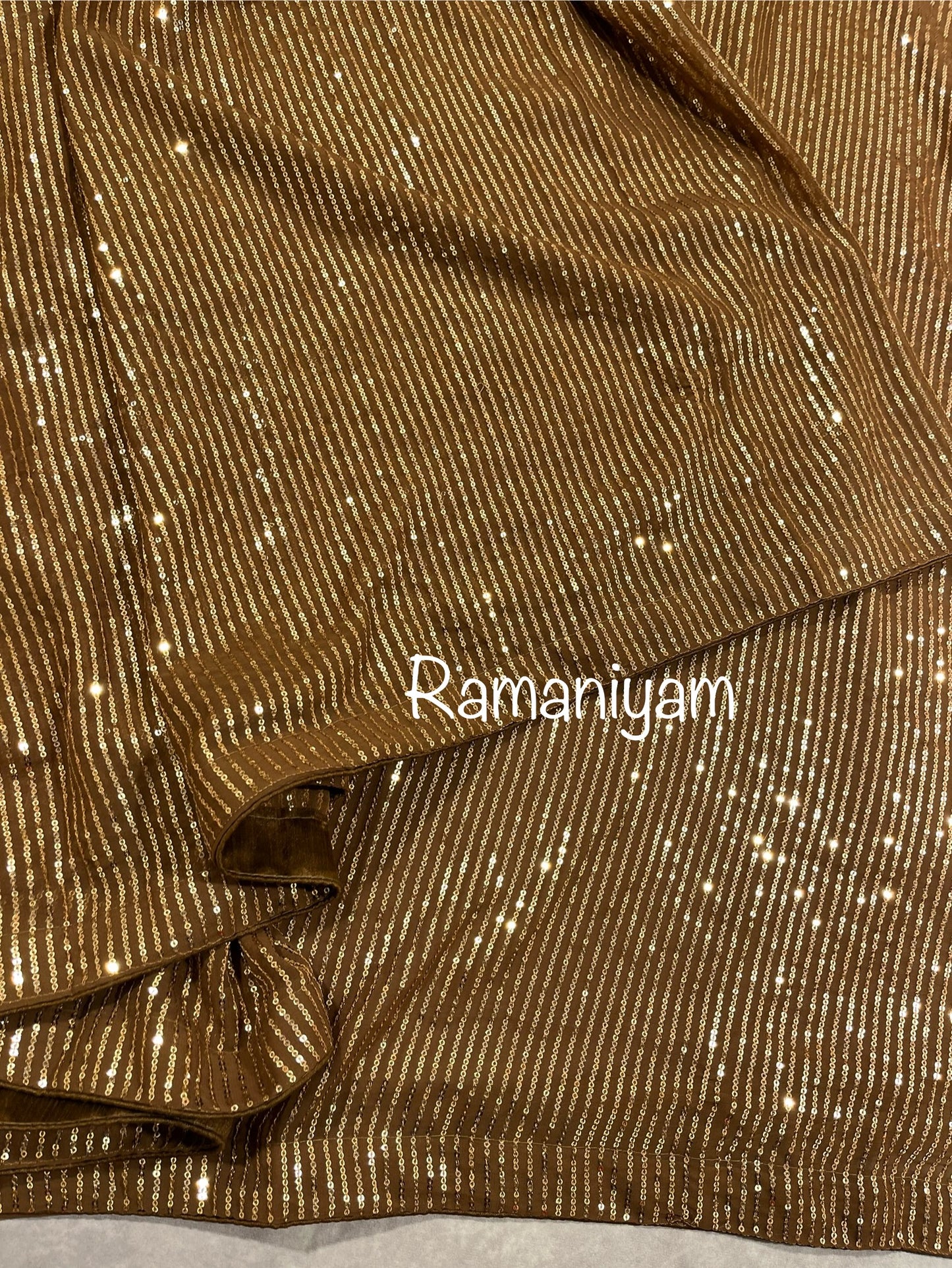 Sequin georgette sarees with sleeveless blouse