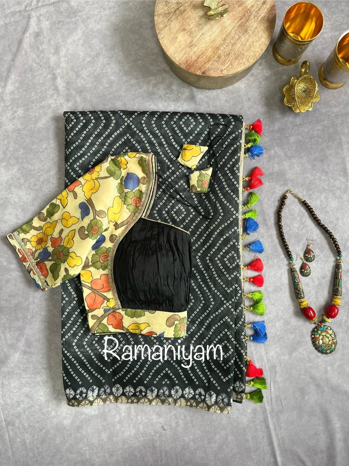 Black Organza Bandhani saree with a Kalamkari pallu - Ramaniyam USA