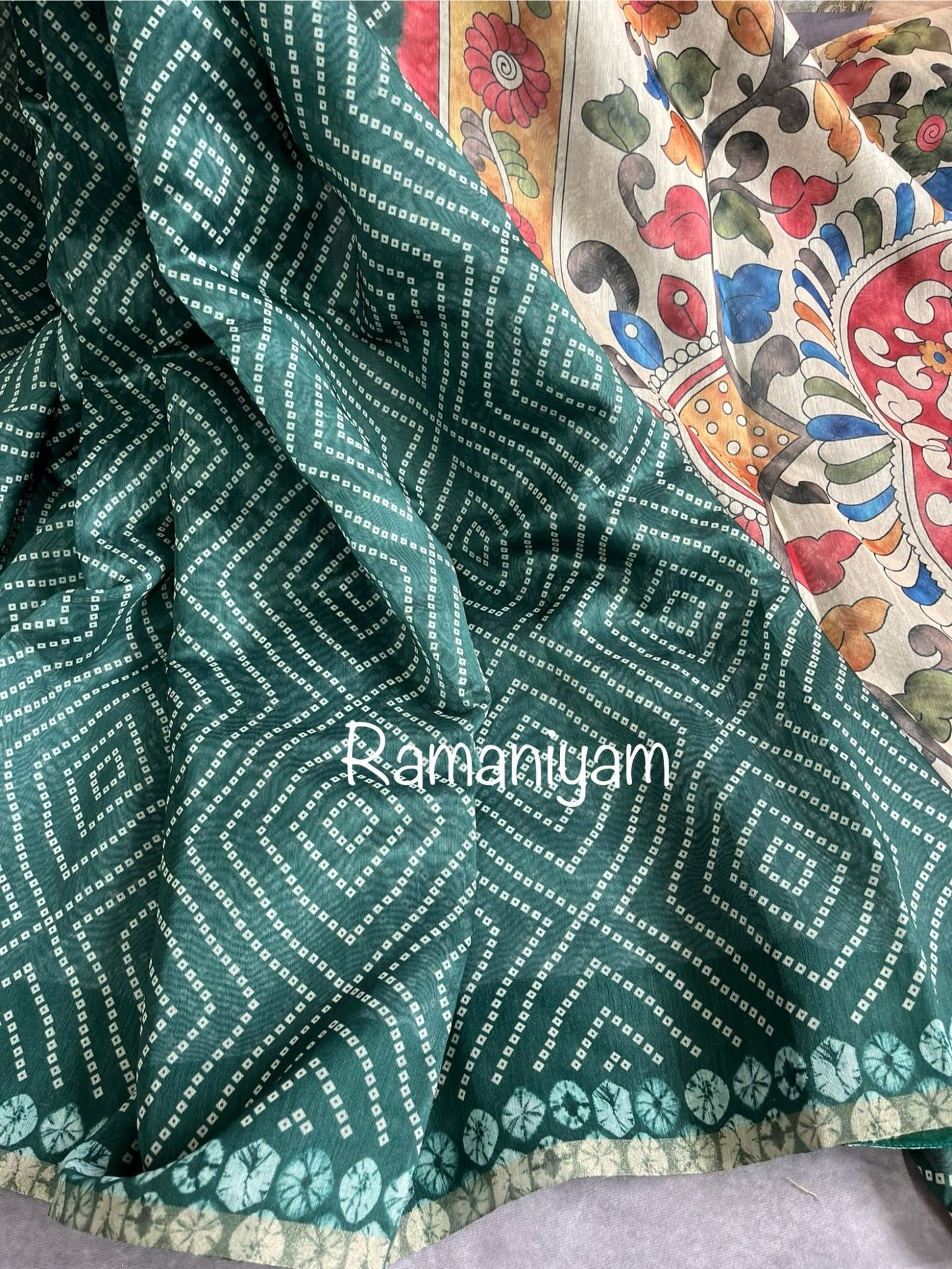 Bottle green Organza Bandhani saree with a Kalamkari pallu - Ramaniyam USA